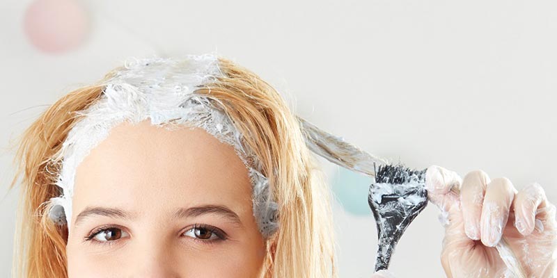 woman bleaching hair